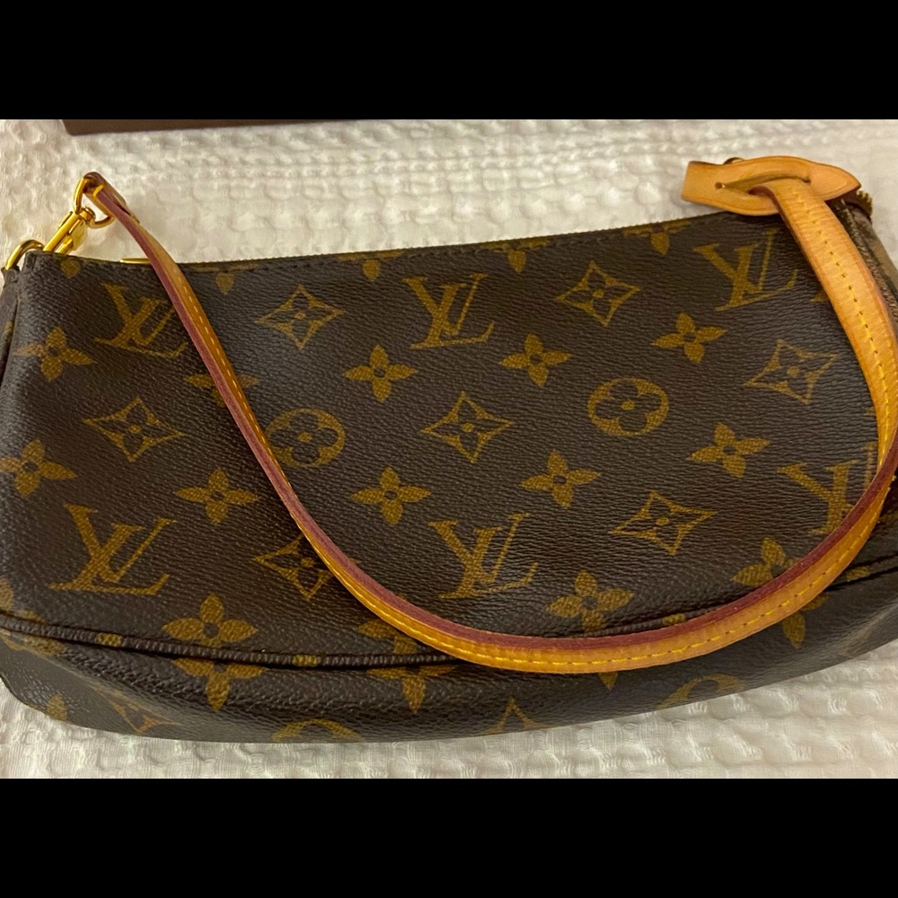 Louis Vuitton Clutch Purse.